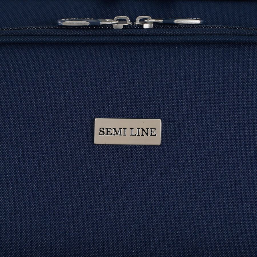 Чемодан Semi Line 24 на 2 колесах полиэстер 600D защищенные колеса +2 кармана объем 50 л синий
